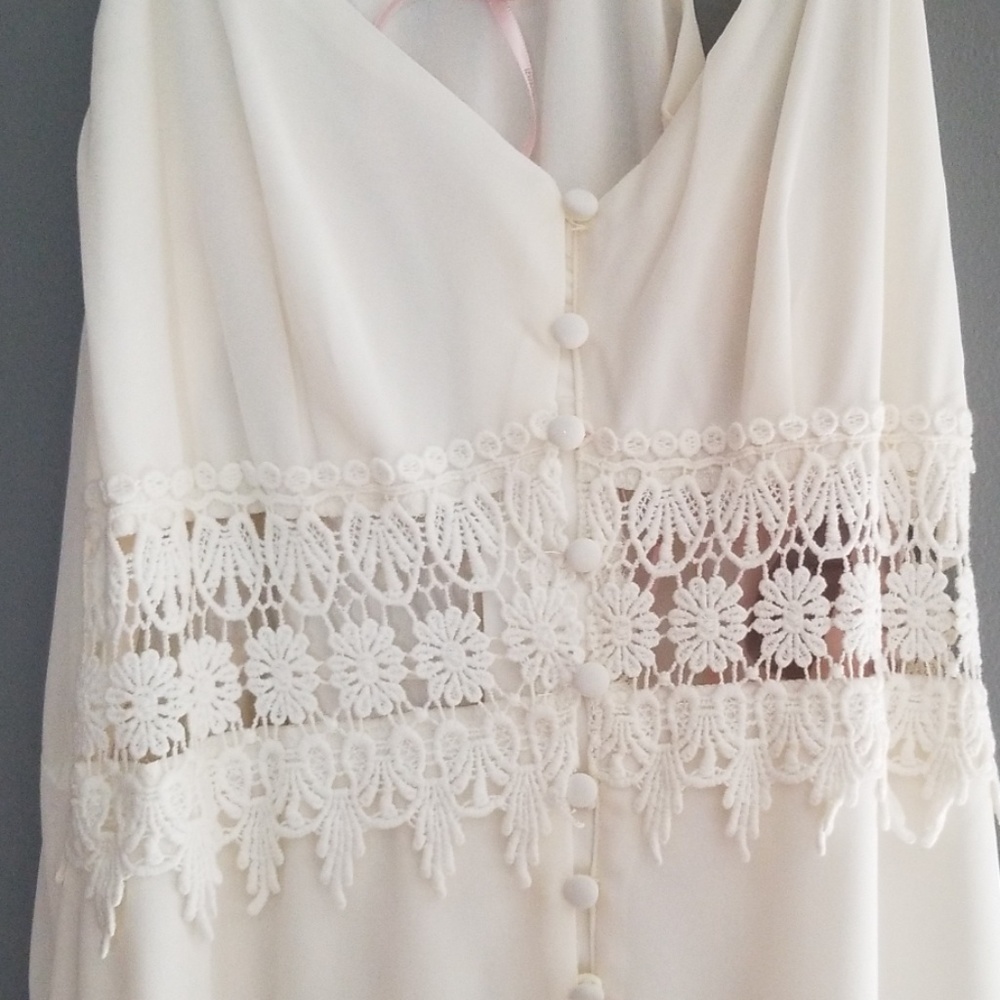 Cream dress with cutout and button detail XS